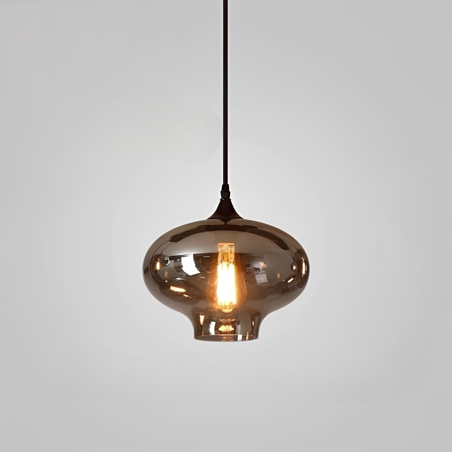 Santara – Lampe suspendue en verre au caractère fort