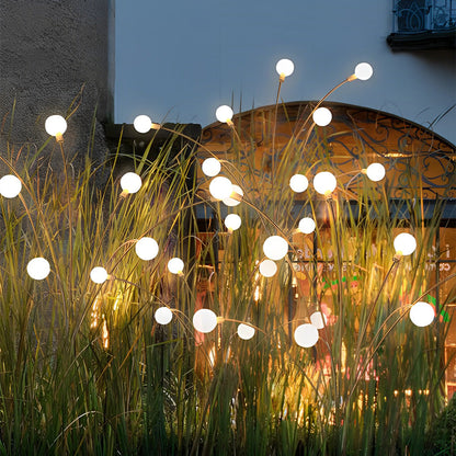Yuna – Lampe de jardin solaire avec effet lucioles