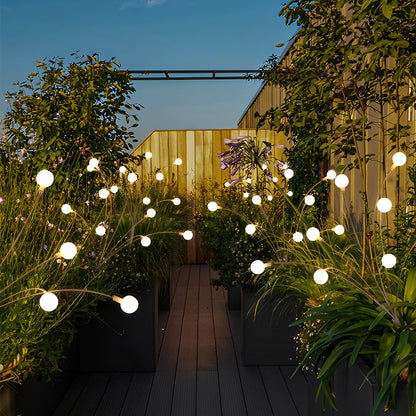 Yuna – Lampe de jardin solaire avec effet lucioles