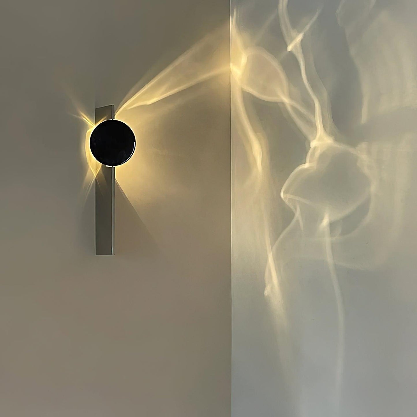 Domesi – Lampe murale avec projection de lumière