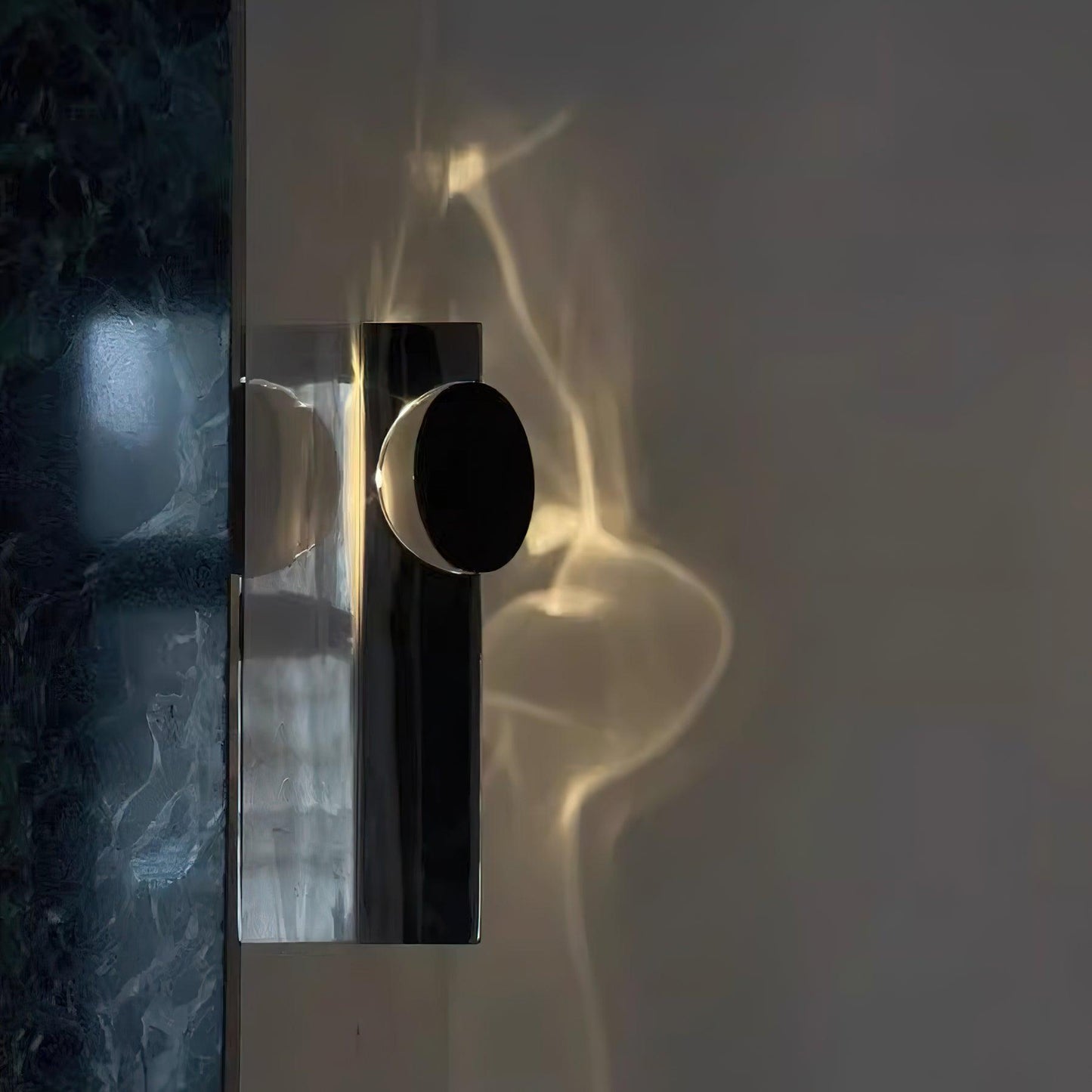 Domesi – Lampe murale avec projection de lumière