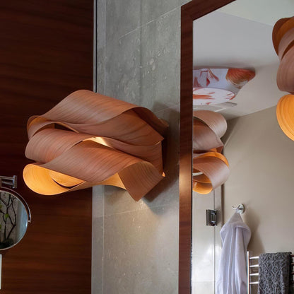FusionLumière – Suspension élégante aux formes fluides et entremêlées