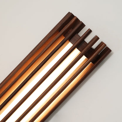 Yara – Lampe murale en noyer