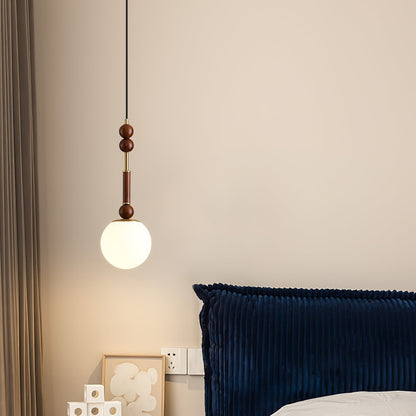 Romy – Suspension style romain avec verre, bois et laiton