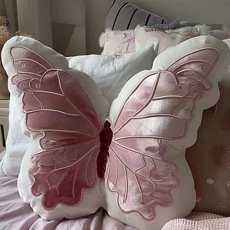 Amara – Coussin papillon douillet