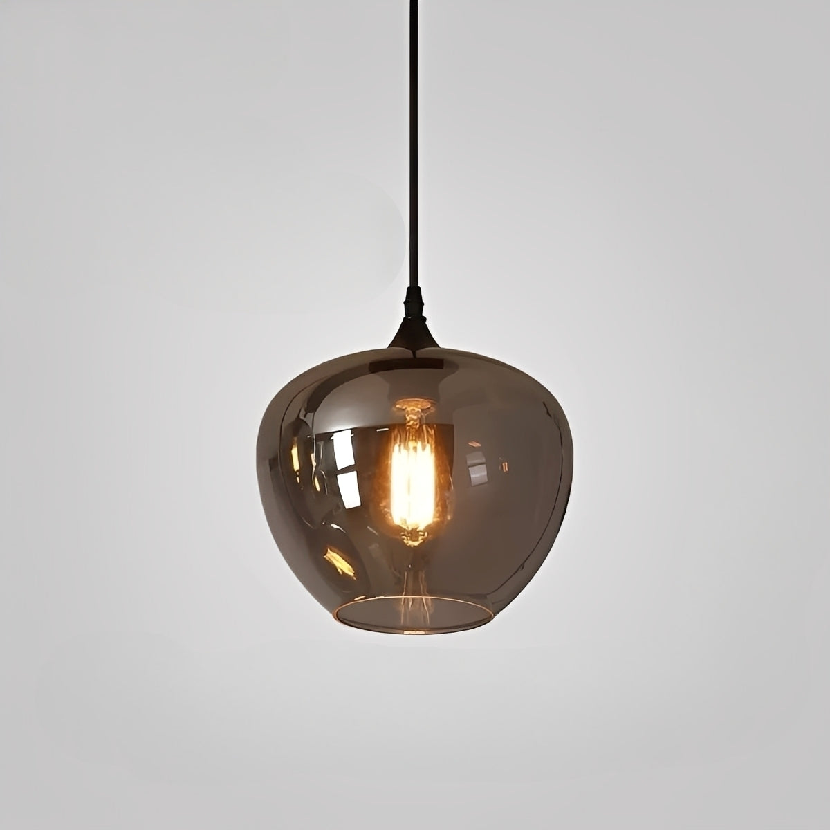 Santara – Lampe suspendue en verre au caractère fort