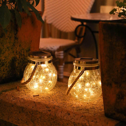 Maribel – Lampe solaire en verre en forme de sphère